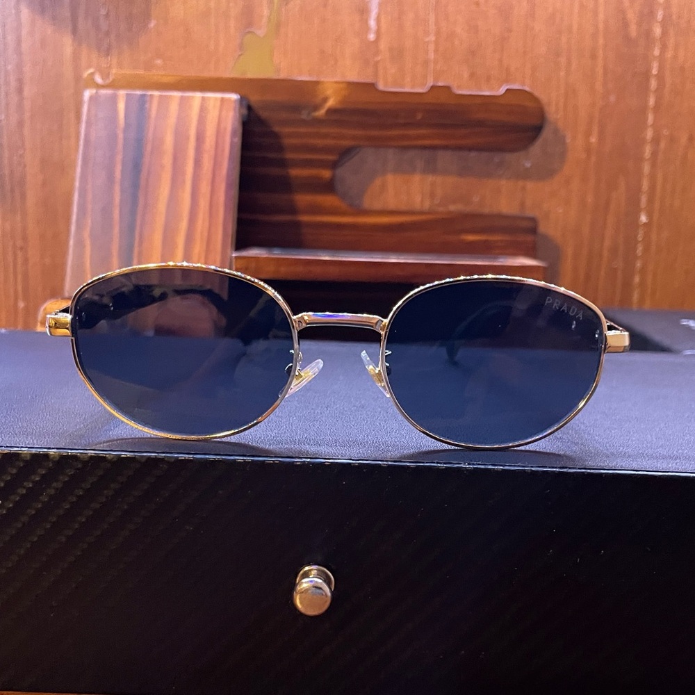 Prada 65ZS Gold/Oval Lense